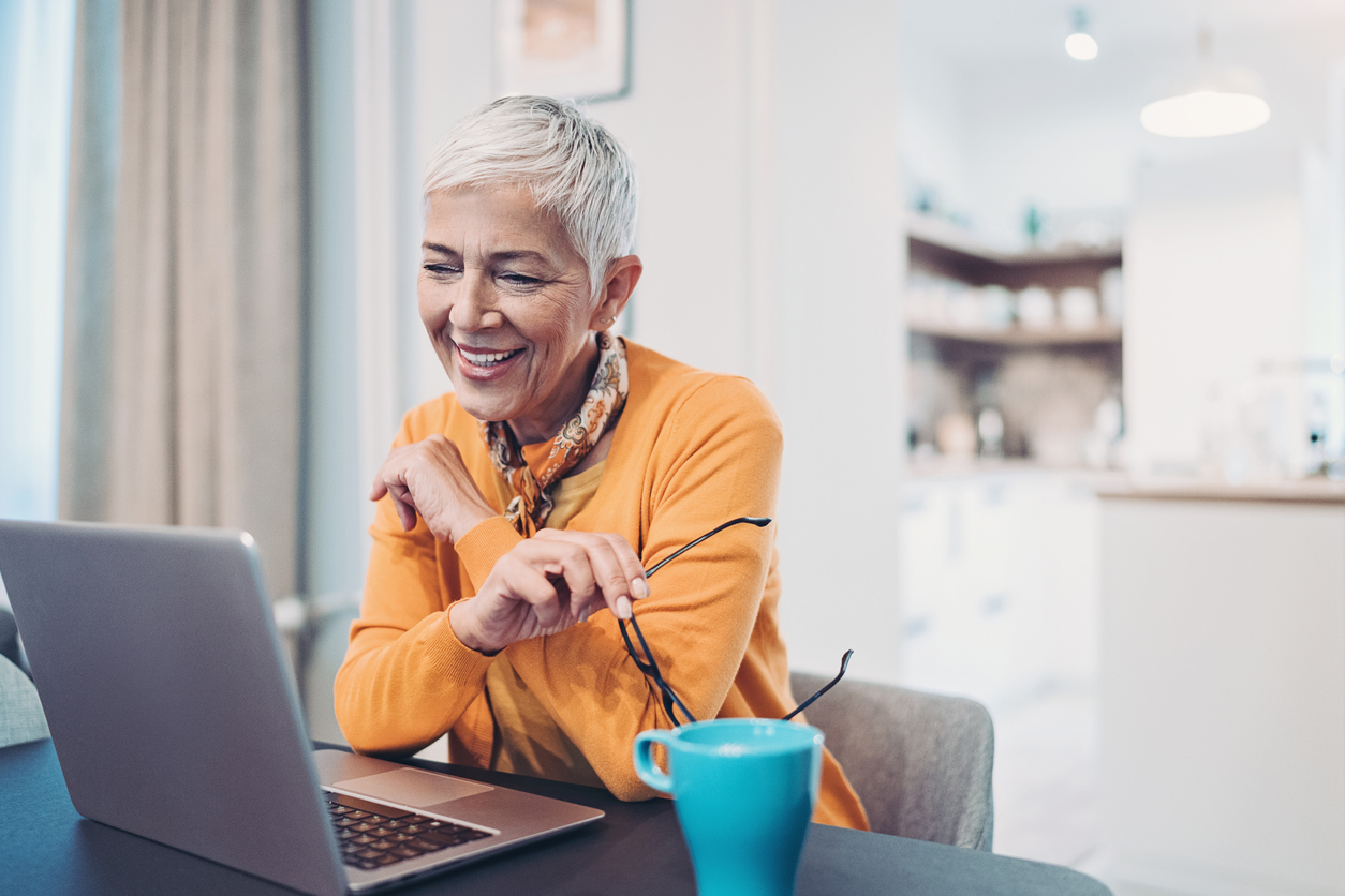 Welcome to Our Blog - Woman reading a blog